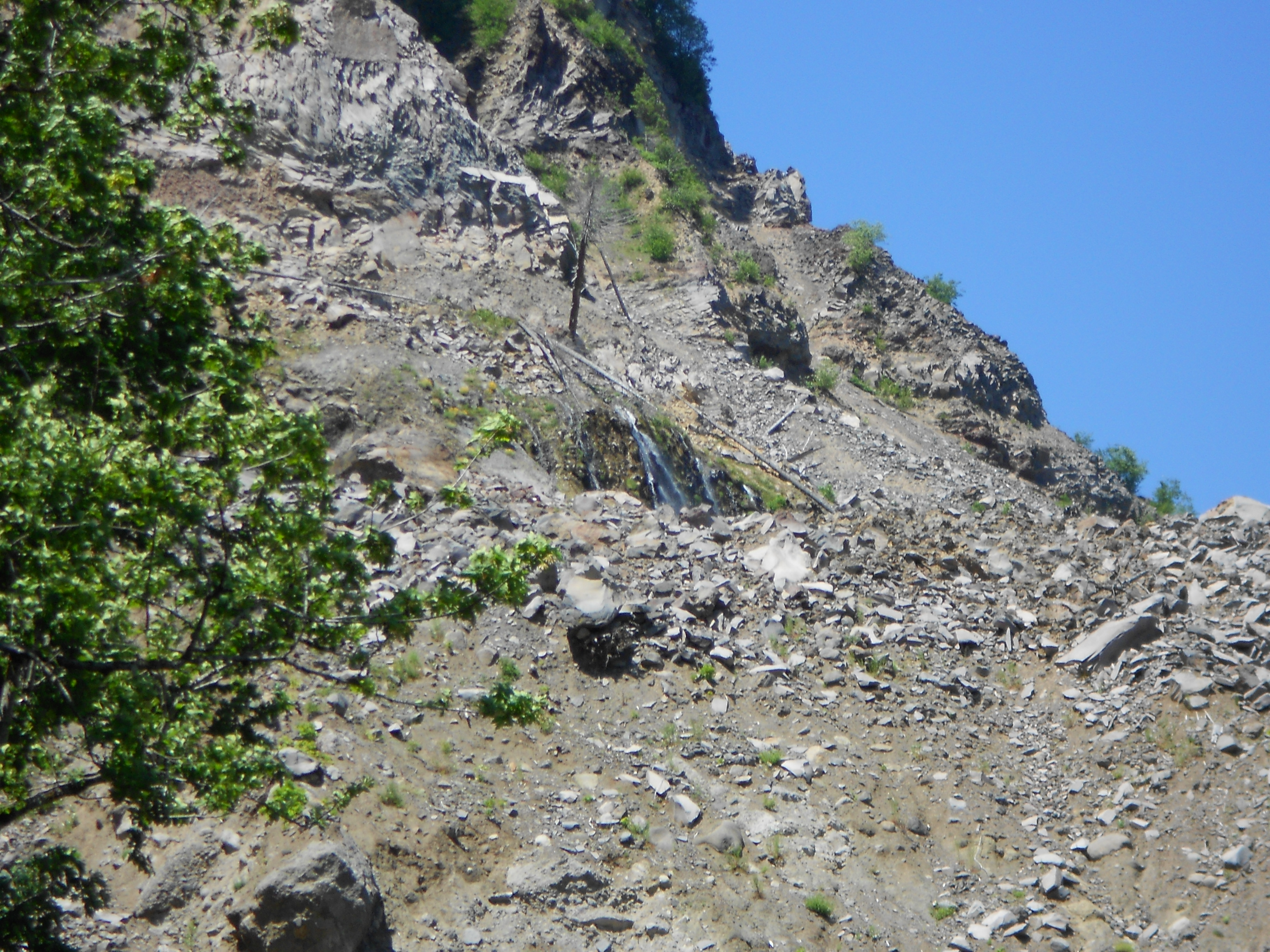 Falls way up towards the start of the slide area!
