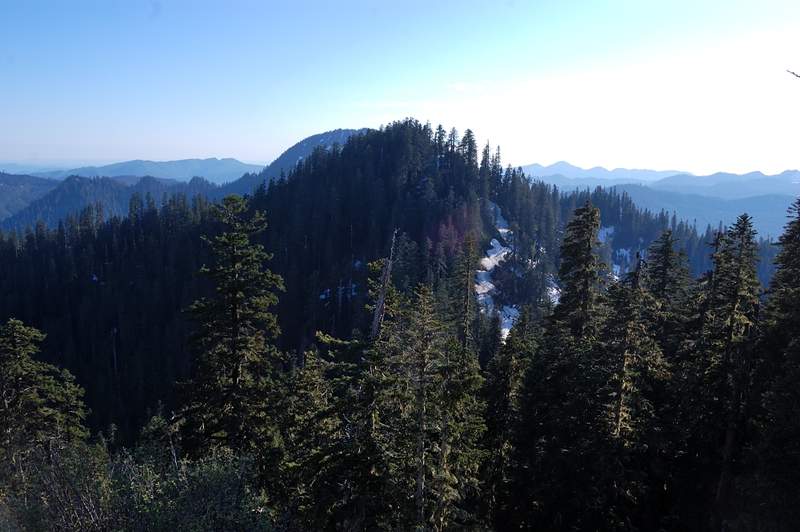 Higher summit to the west