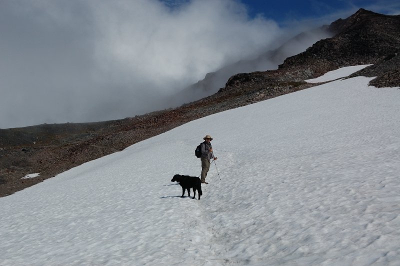 My mom and Pepper nearing a cloud upon Packwood viewpoint