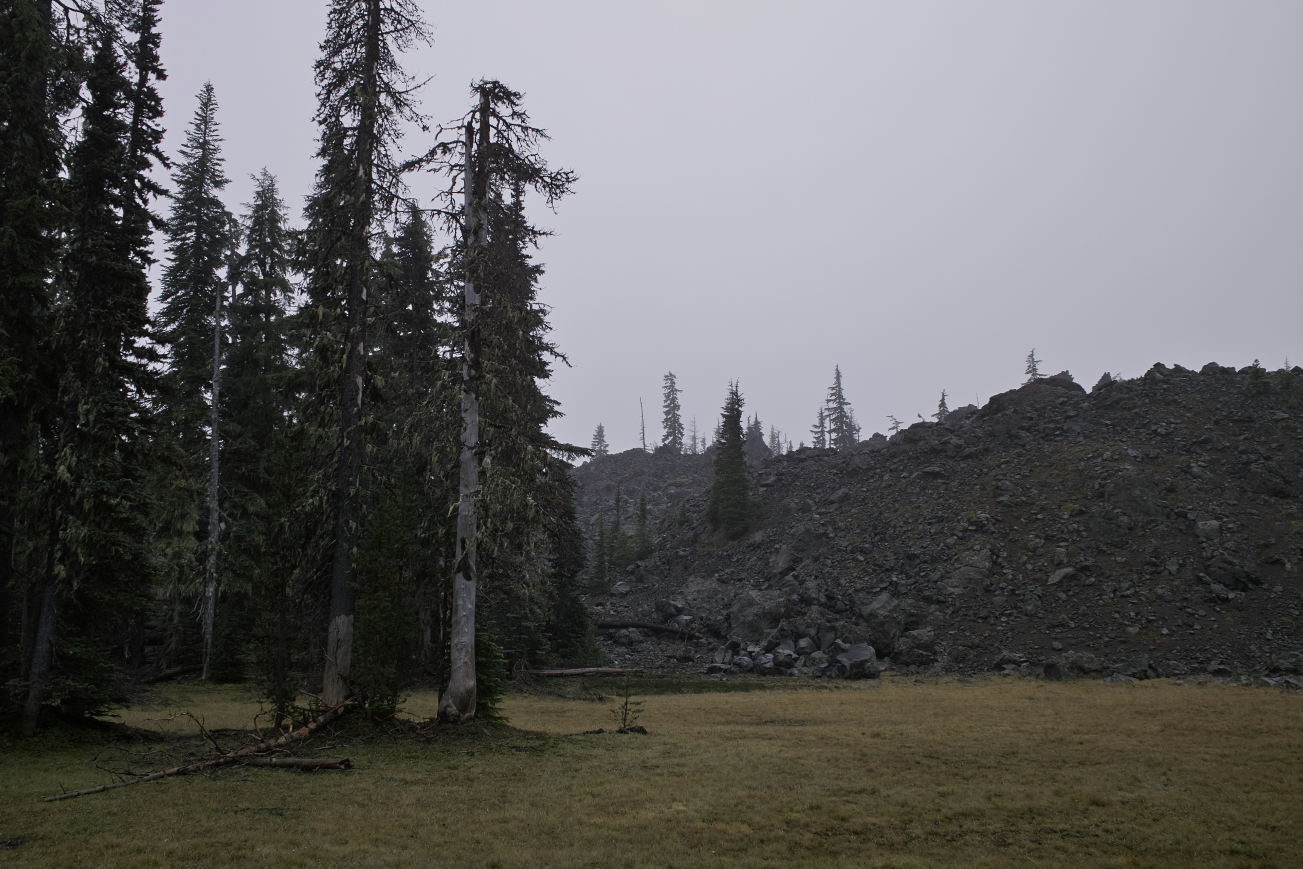 A lava pile next to some fog.