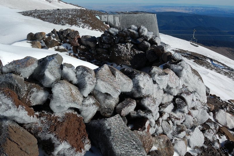 Iced wind wall (somebody tried to camp?) and the upper Palmer lift terminal