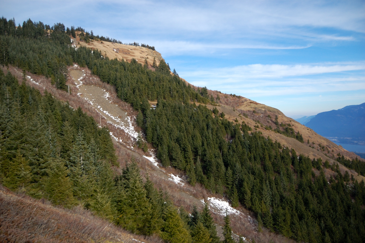 Snow mostly melted off, except for summit plateau