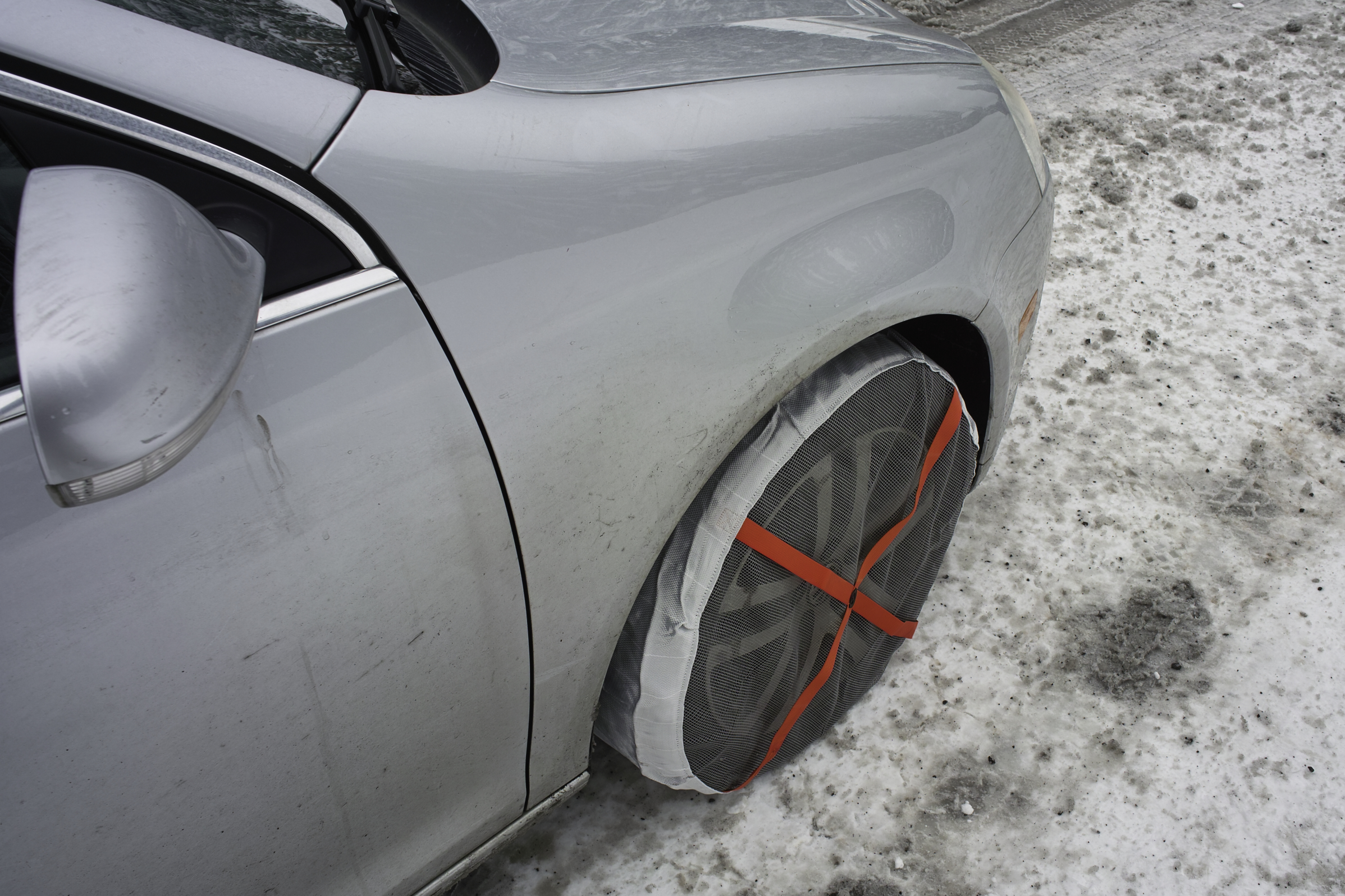 Chains were required because of all the ice, so this was my first time trying these Autosocks. They're like big shower caps. They worked extremely well, and were super easy to take on and off—you just had to keep it under 30mph.