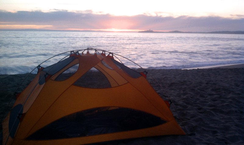 Watching the sunset from my tent on the beach
