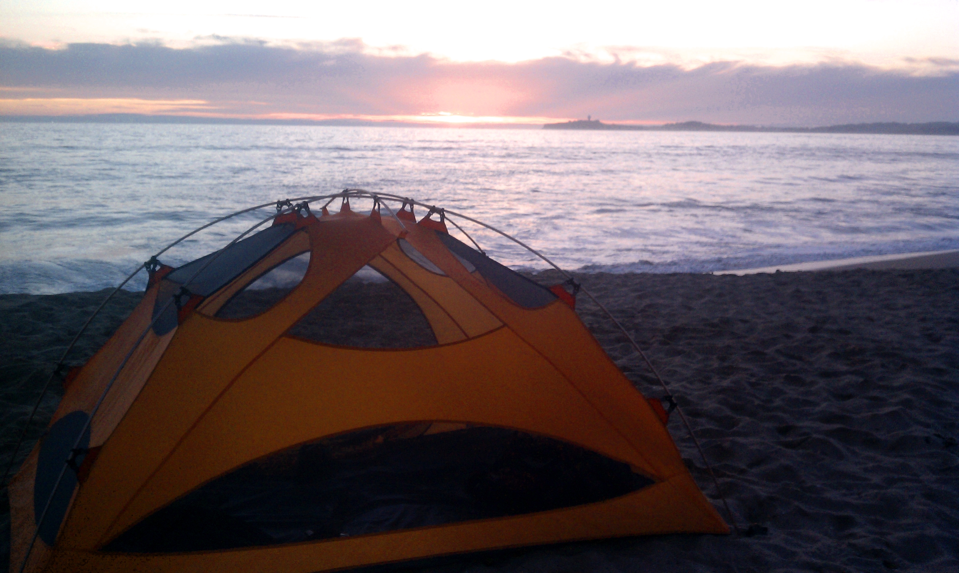 Watching the sunset from my tent on the beach