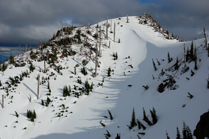 Back side of "Stump Hill", as seen from Arch RIdge. Note a huge snowdrift at the saddle