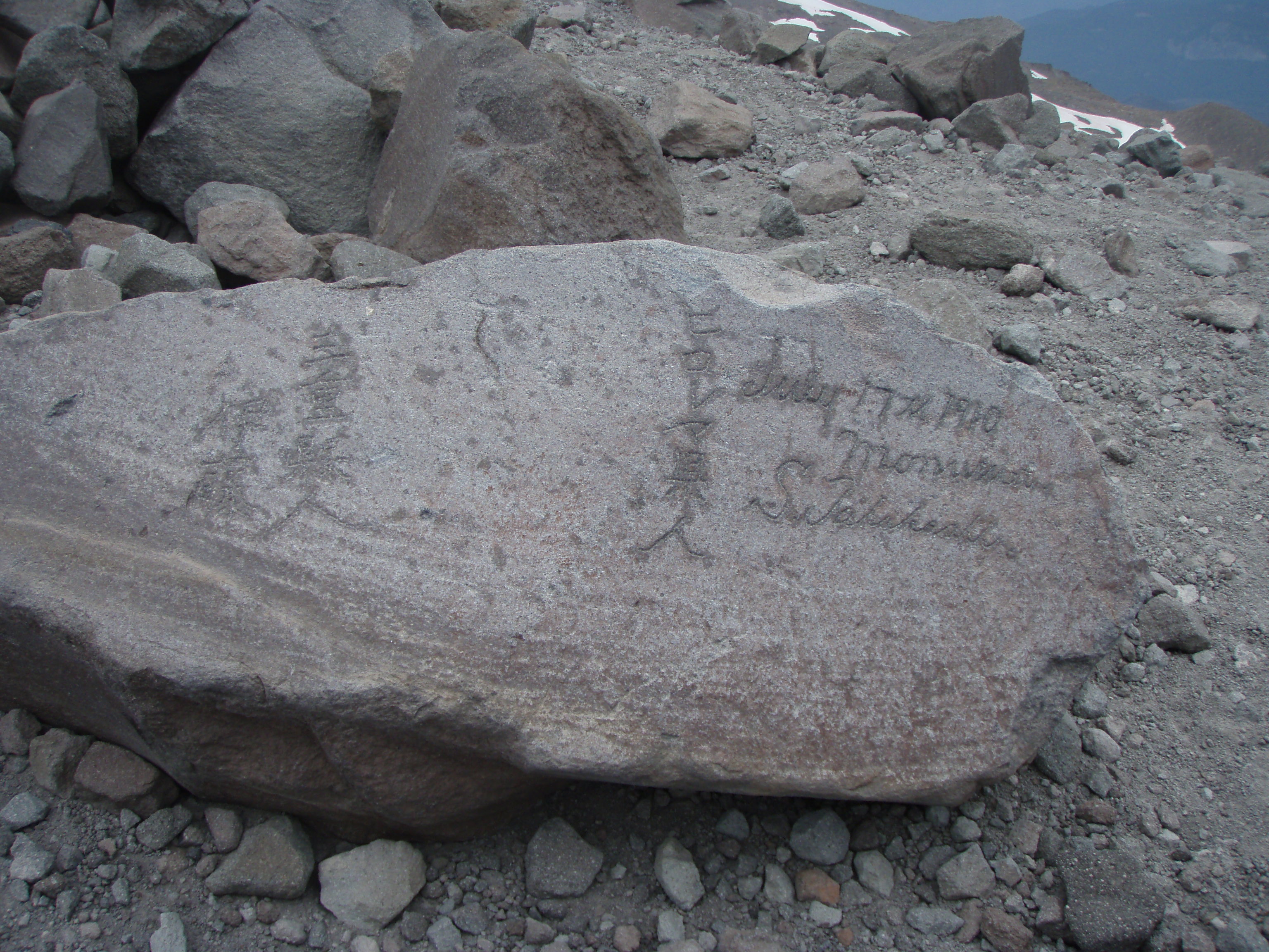 Rock with an inscription from a Japanese climbing party in 1910
